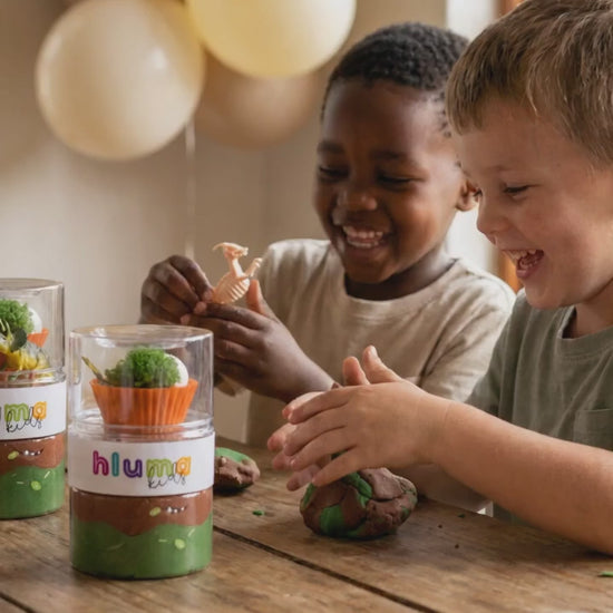 Hluma Kids Dinosaur Discovery Wonder Jar product video, kids playing with dinosaur figures and playdough