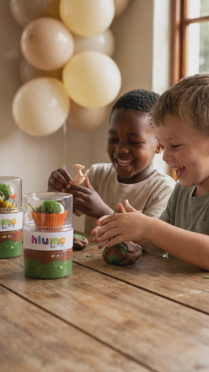 Hluma Kids Dinosaur Discovery Wonder Jar product video, kids playing with dinosaur figures and playdough