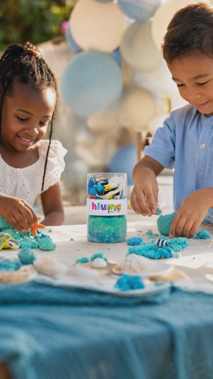 Hluma Kids Waves and Wonders Wonder Jar product video, kids playing with sea-creature figures and teal playdough