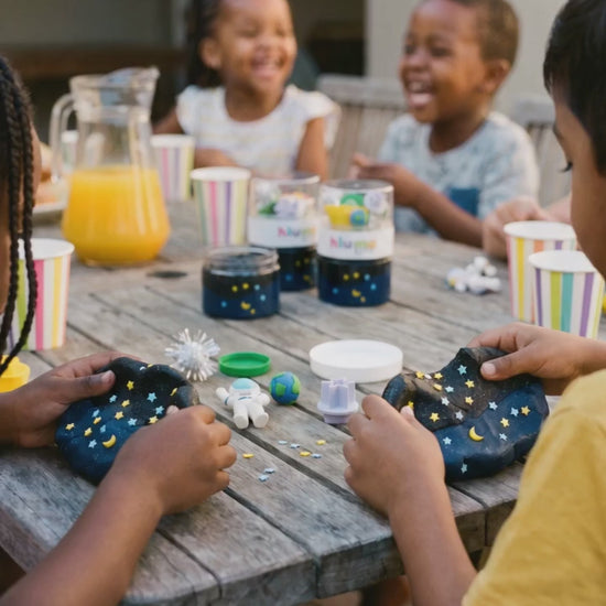 Hluma Kids Cosmic Quest Wonder Jar product video, kids playing with space figures and playdough